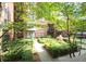 Secluded courtyard with lush landscaping and direct access to the condominium building at 850 Piedmont Ne Ave # 1206, Atlanta, GA 30308