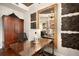 Spacious home office with an oversized desk, ample storage, and stylish decor at 850 Piedmont Ne Ave # 1206, Atlanta, GA 30308