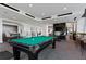 Inviting game room with a well-maintained pool table and comfortable seating areas at 855 Peachtree Ne St # 2205, Atlanta, GA 30308