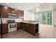 Kitchen with stainless steel appliances, granite countertops and a breakfast bar at 855 Peachtree Ne St # 2205, Atlanta, GA 30308
