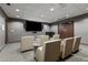 Private theater room with comfortable seating and a large screen for an immersive experience at 855 Peachtree Ne St # 2205, Atlanta, GA 30308