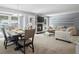 Open-concept living area with a fireplace, recessed lighting, and access to an outdoor patio at 2711 Bluffton Rd, Buford, GA 30519