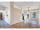 Open dining room featuring hardwood floors and neutral paint at 3337 Camens Way, Buford, GA 30519