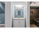Nicely decorated bathroom with granite countertop, updated fixtures, and a marble shower at 4339 Rushmore Pl, Forest Park, GA 30297