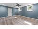 Spacious bedroom with hardwood floors, two windows and a ceiling fan at 4339 Rushmore Pl, Forest Park, GA 30297