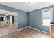 Dining area with wood flooring and access to the kitchen at 4339 Rushmore Pl, Forest Park, GA 30297