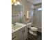 Bathroom featuring tiled walls, a marble vanity, and modern fixtures at 4845 Weathervane Dr, Alpharetta, GA 30022
