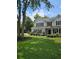 Beautiful two-story home with a lush front yard and an elegant facade at 4845 Weathervane Dr, Alpharetta, GA 30022