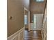 Inviting Foyer with staircase and paneled wall at 4845 Weathervane Dr, Alpharetta, GA 30022