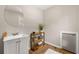 A simple bathroom provides a sink, storage, and beverage cooler for basic functionality at 1444 Arden Sw Dr, Marietta, GA 30008