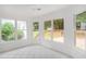 Cozy breakfast area with large windows and a view of the backyard deck at 1721 Druids Se Xing, Conyers, GA 30013