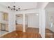Open concept area showcasing dining room leading to the kitchen and living room at 1721 Druids Se Xing, Conyers, GA 30013