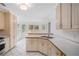 Bright kitchen with white countertops and tile floor, perfect for Gathering meals and entertaining at 1721 Druids Se Xing, Conyers, GA 30013