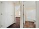 Hallway view with access to the bedroom, showcasing the home's layout at 5718 Hidden Brook Cir, Atlanta, GA 30349