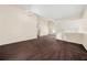 Large living area with high ceilings and a decorative chandelier for elegant lighting at 5718 Hidden Brook Cir, Atlanta, GA 30349