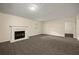 Living room featuring a fireplace and lots of light at 5718 Hidden Brook Cir, Atlanta, GA 30349