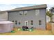 Grilling patio at the back of the house with a grill and outdoor seating at 7246 Gladstone Cir, Lithonia, GA 30038