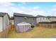 Backyard featuring a well-maintained lawn and a stylish gazebo, perfect for outdoor relaxation and entertainment at 7246 Gladstone Cir, Lithonia, GA 30038