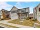 Beautiful two-story brick home with a manicured lawn, and a two-car garage at 7246 Gladstone Cir, Lithonia, GA 30038