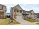 Beautiful two-story brick home with a manicured lawn, and a two-car garage at 7246 Gladstone Cir, Lithonia, GA 30038