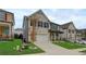 Beautiful two-story brick home with a manicured lawn, and a two-car garage at 7246 Gladstone Cir, Lithonia, GA 30038