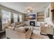 Comfortable living room with fireplace, built-ins, and neutral decor at 7246 Gladstone Cir, Lithonia, GA 30038
