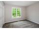Bedroom with plush carpet and a large window with a view at 75 Willow Bend Nw Dr, Cartersville, GA 30121