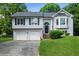 Charming home with a two-car garage and beautifully landscaped front yard at 75 Willow Bend Nw Dr, Cartersville, GA 30121