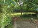 Backyard of home shows path and green yard at 1526 Snapfinger Rd, Decatur, GA 30032