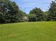 Large yard with trees at 1526 Snapfinger Rd, Decatur, GA 30032