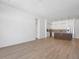 Spacious open-concept with wood floors, light-colored walls and modern kitchen at 675 Drewry Ne St # 205, Atlanta, GA 30306