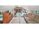 Spacious attic bedroom features a cozy living space and a comfortable queen-sized bed at 2130 Hampton Se Trl, Conyers, GA 30013