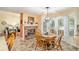 Cozy eat-in kitchen with a brick fireplace and lots of natural light at 2130 Hampton Se Trl, Conyers, GA 30013