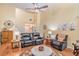Bright and airy living room with high ceilings, ceiling fan, and comfortable seating arrangement, perfect for relaxation at 2130 Hampton Se Trl, Conyers, GA 30013