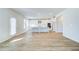 Contemporary kitchen with stainless appliances, island, and white cabinets at 249 Chiswick Loop, Stockbridge, GA 30281