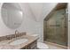 Updated bathroom with stone countertops and glass shower at 4116 River Cliff Chase Se, Marietta, GA 30067