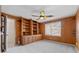 Well-lit bedroom with built-in shelving, plush carpeting, and ample closet space at 4116 River Cliff Chase Se, Marietta, GA 30067