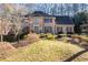 Beautiful brick home with manicured landscaping and a well-maintained front lawn at 4116 River Cliff Chase Se, Marietta, GA 30067