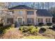 Charming brick home featuring manicured landscaping and a welcoming front entrance at 4116 River Cliff Chase Se, Marietta, GA 30067