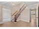 Foyer with staircase and hardwood flooring, creates a welcoming and grand entrance at 4116 River Cliff Chase Se, Marietta, GA 30067