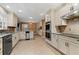 Well-appointed kitchen featuring granite countertops and stainless steel appliances at 4116 River Cliff Chase Se, Marietta, GA 30067