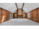 Living room with fireplace, abundant natural light, and wood paneling at 4116 River Cliff Chase Se, Marietta, GA 30067