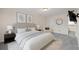 Bright main bedroom with carpeted floors, two nightstands, and modern decorations, creating a stylish sanctuary at 4116 River Cliff Chase Se, Marietta, GA 30067