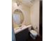 Well-lit half bathroom with stylish vanity, updated fixtures, and clean design at 2315 Oakland Spring Dr, Snellville, GA 30039