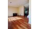 Inviting living room with gleaming hardwood floors and ample natural light streaming through the windows creating a warm atmosphere at 2315 Oakland Spring Dr, Snellville, GA 30039