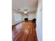 Bright living room featuring hardwood floors, a fireplace, and large windows at 2315 Oakland Spring Dr, Snellville, GA 30039