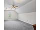 Bedroom featuring neutral walls and ceiling fan, carpeted floor, and a window at 3906 Laurens Ln, Snellville, GA 30039