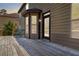 Home's back deck with a seating area, perfect for relaxation and outdoor enjoyment at 4249 Caveat Ct, Fairburn, GA 30213