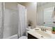 Cozy bathroom featuring a shower-tub combo with a patterned shower curtain at 4249 Caveat Ct, Fairburn, GA 30213