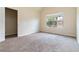 Bright bedroom featuring natural light and closet, ready for your personal touch at 4249 Caveat Ct, Fairburn, GA 30213